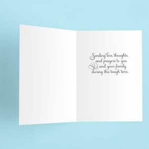 May include: A white card with a black message that reads "Sending love, thoughts and prayers to you and your family during this tough time."