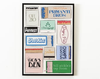 May include: A colorful poster with a collage of matchboxes featuring the names of various bars and restaurants in Pittsburgh, Pennsylvania. The matchboxes are arranged in a grid pattern and feature a variety of colors and designs. The poster is framed in black and is hanging on a white wall.