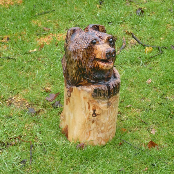 Chainsaw Carved Bear in a log