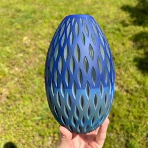 Blue and Uranium Carved Glass Vase