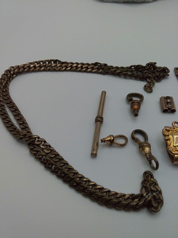 Lot of assorted watch fobs slides and chain - image 4