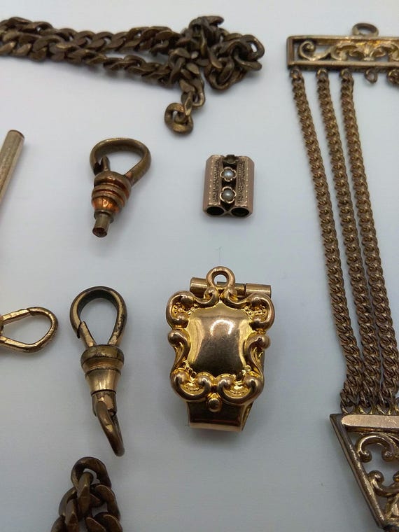 Lot of assorted watch fobs slides and chain - image 2