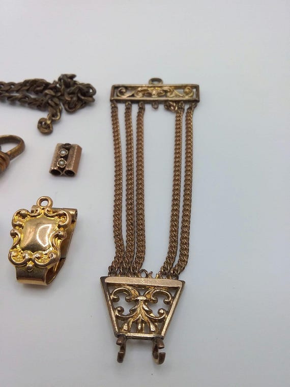 Lot of assorted watch fobs slides and chain - image 3