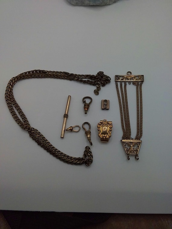 Lot of assorted watch fobs slides and chain - image 1