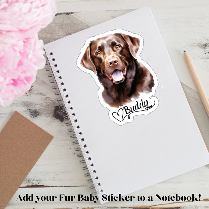 May include: A brown and white watercolor illustration of a Labrador Retriever dog with the name "Buddy" written in cursive with a heart symbol. The illustration is printed on a white sticker.