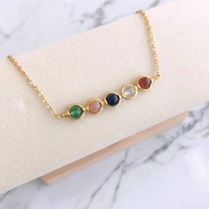 Sagittarius zodiac necklace with natural Sunstone, Blue Tiger Eye, and Green Strawberry quartz. Personalized crystal healing jewelry for women, astrology gift.