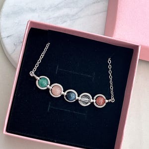 Beautifully packaged zodiac crystal necklace in a pink gift box. Ready for gifting, perfect for birthday, anniversary, or Christmas present.
