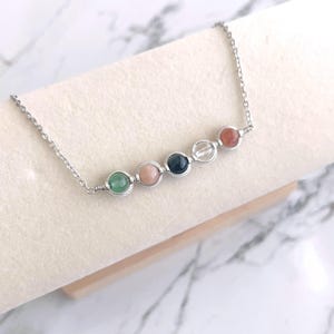 Handmade wire-wrapped constellation necklace available in silver plated finish. Minimalist multi-gemstone dainty jewelry for daily wear.