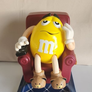 Yellow M&M in LA-Z-BOY Recliner Candy Dispenser