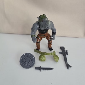 Complete Rocksteady from Teenage Mutant Ninja Turtles Action Figure