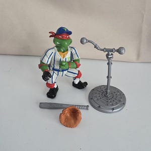 Kompletna figurka akcji Grand Slammin&#39; Raph Wojownicze Żółwie Ninja