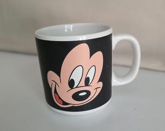 Taza de café vintage negra de Mickey y Minnie