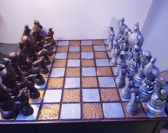 Birds themed Chess Set, cast in Stone finished in Bronze and Silver Gilding