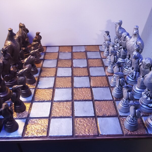 Birds themed Chess Set pieces, cast in Stone finished in Bronze and Silver Gilding