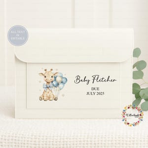 May include: Cream-colored baby announcement card with a flap closure. The front features a watercolor illustration of a giraffe holding blue balloons, with the text "Baby Fletcher DUE JULY 2025". The words "ALL TEXT IS EDITABLE" are also visible.
