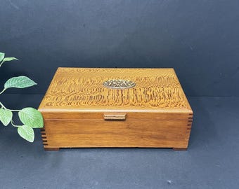 Vintage large handmade wooden footed box. Leopardwood lid handcrafted not lined. Lightweight 10”x 6”x 3.5” Not lacquered wood carved flowers