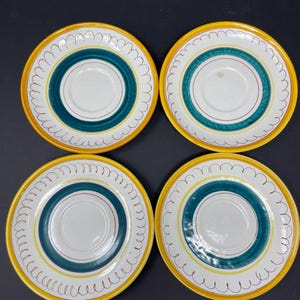 Vintage Stangl saucers set of 4. Diameter 6” inches. Replacements yellow white green teacup small plates.