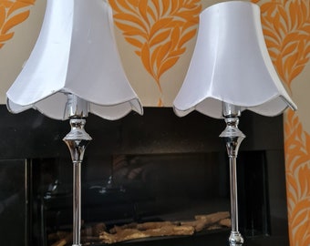 silver lamp with white silk fabric shades.silver base