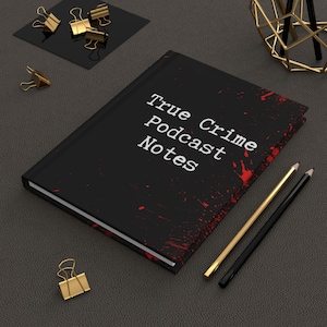 May include: Black notebook with red splatter paint and the words "True Crime Podcast Notes" in white text.