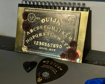 Journal pour planche de ouija avec deux planchettes