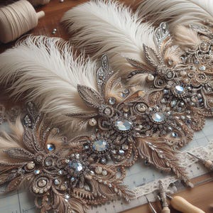 May include: A close-up of a decorative trim featuring intricate beading, embroidery, and feathers. The trim is made with gold and silver thread, and features a variety of crystals and beads. The trim is perfect for adding a touch of elegance to any project.