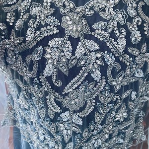 Custom made blouse bodice with exquisite fine embroidery . with silver, offwhite sequins petals and highlighted with ivory thread