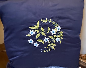 Blue floral embroidered pillow