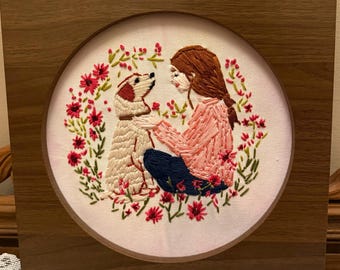 Hand embroidered girl with dog