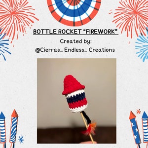 May include: A handmade crochet bottle rocket "firework" in red, white, and blue. The rocket has a red cone top, white and navy blue stripes, and is attached to a wooden stick with decorative feathers. Text on the image reads "Bottle Rocket Firework" and "Created by: @Cierras_Endless_Creations."