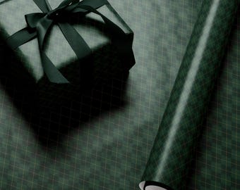 May include: A green and gold plaid wrapping paper roll and a wrapped gift box with a black satin ribbon.