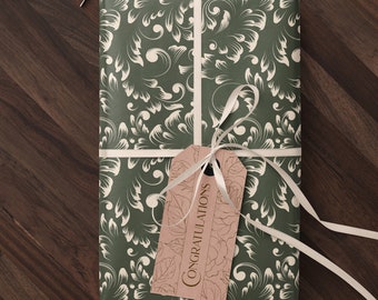May include: A green and white gift box with a white ribbon and a brown tag that says "Congratulations".