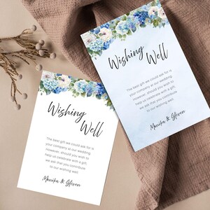 Puede incluir: Dos tarjetas rectangulares de boda Wishing Well con un borde floral de acuarela de hortensias azules y blancas en la parte superior. El texto dice Wishing Well, seguido de un poema sobre regalos de boda y los nombres Monika & Steven abajo.