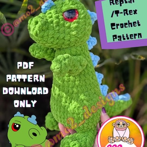 May include: A green crocheted dinosaur toy with blue accents, large red-rimmed eyes, and a cartoon illustration. The image includes text that reads "Reptar / T-Rex Crochet Pattern" and "PDF Pattern Download Only."