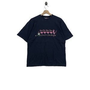 T-shirt del film PINK PANTHER vintage del cartone animato americano del 1998