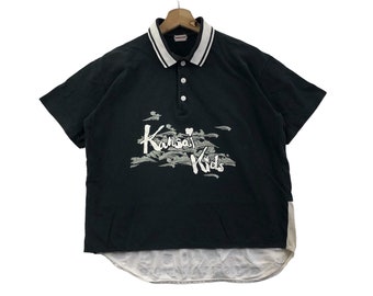 Vintage Marchio giapponese KANSAI KIDS ARTWORK Polo