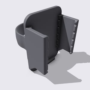 Peut inclure: Un support de téléphone gris avec une bague au dos et un support qui se replie. Le support a une surface texturée.