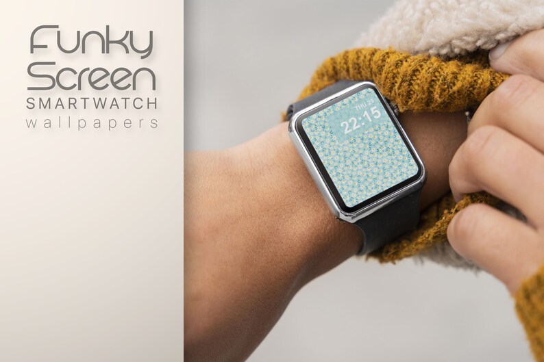 K&ouml;nnte beinhalten: Eine Smartwatch mit einem schwarzen Armband und einem wei&szlig;en Hintergrund mit einem blauen Blumenmuster. Die Uhrzeit ist 22:15.