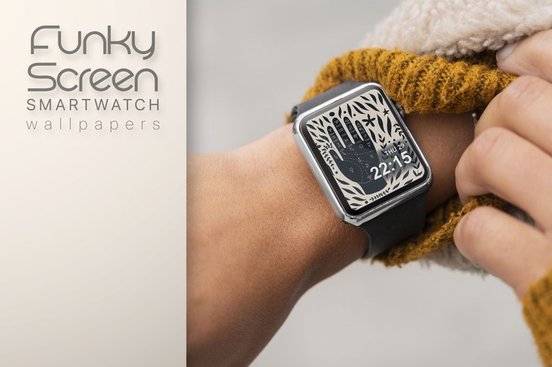 Puede incluir: Un smartwatch con una banda negra y una esfera blanca con un dise&ntilde;o de mano negra. La hora se muestra como 22:15, junto con el texto "THU 29".