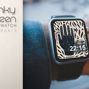 Puede incluir: Un smartwatch con una banda negra y una esfera blanca que muestra una mano negra con l&iacute;neas y s&iacute;mbolos. La hora es 22:15 y la fecha es JUE 29.