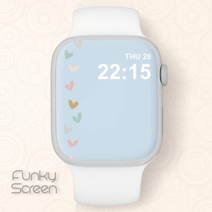 Może przedstawiać: Biały smartwatch z jasnoniebieskim ekranem wyświetlającym godzinę, datę i wz&oacute;r kolorowych serc. Zegarek ma biały pasek, a na dole znajduje się napis "Funky Screen".