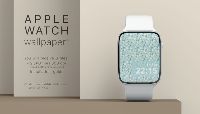 K&ouml;nnte beinhalten: Eine wei&szlig;e Apple Watch mit einem blauen und wei&szlig;en floralen Hintergrundbild. Das Zifferblatt der Uhr zeigt Datum und Uhrzeit an: DO 29 22:15.