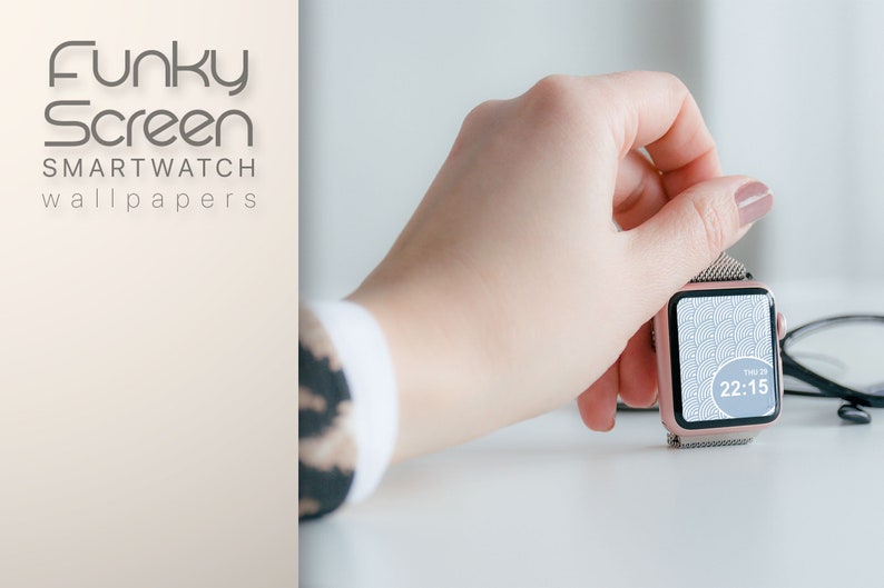 May include: A rose gold smartwatch with a white and gray geometric pattern on the screen. The time is 22:15.