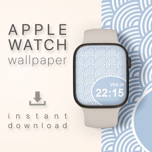 May include: A white Apple Watch with a blue and white geometric pattern wallpaper. The watch face displays the time 22:15 and the date VEN 29.