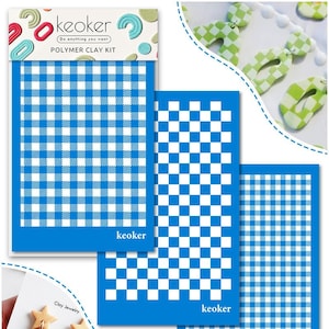 Op de afbeelding: Drie polymer clay sjablonen met blauw-witte ruitjes en schaakbordpatronen. De sjablonen zijn gelabeld met "keoker" en "Do anything you want - Polymer Clay Kit".