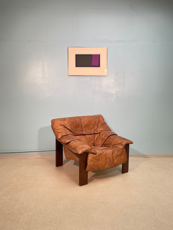 Vintage leather lounge chair safari chair from the 1970s