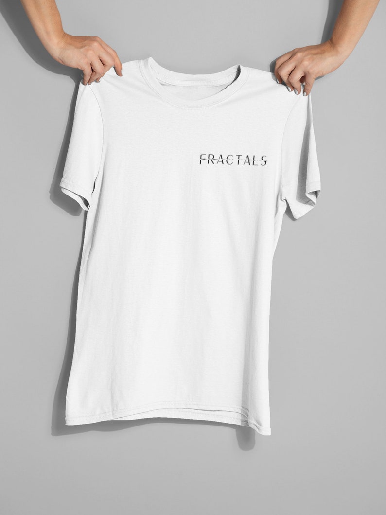 May include: White t-shirt with the word "FRACTALS" printed in black on the front.