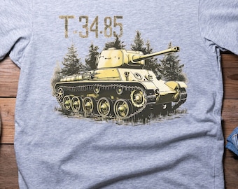 May include: A gray t-shirt with a graphic of a military tank in a forest setting. The tank is labeled "T-34.85".