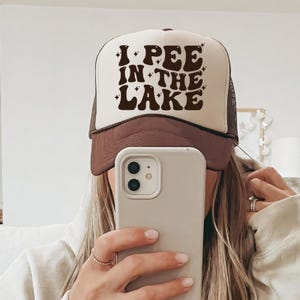 a woman taking a selfie with her phone