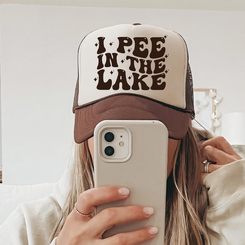 a woman taking a selfie with her phone