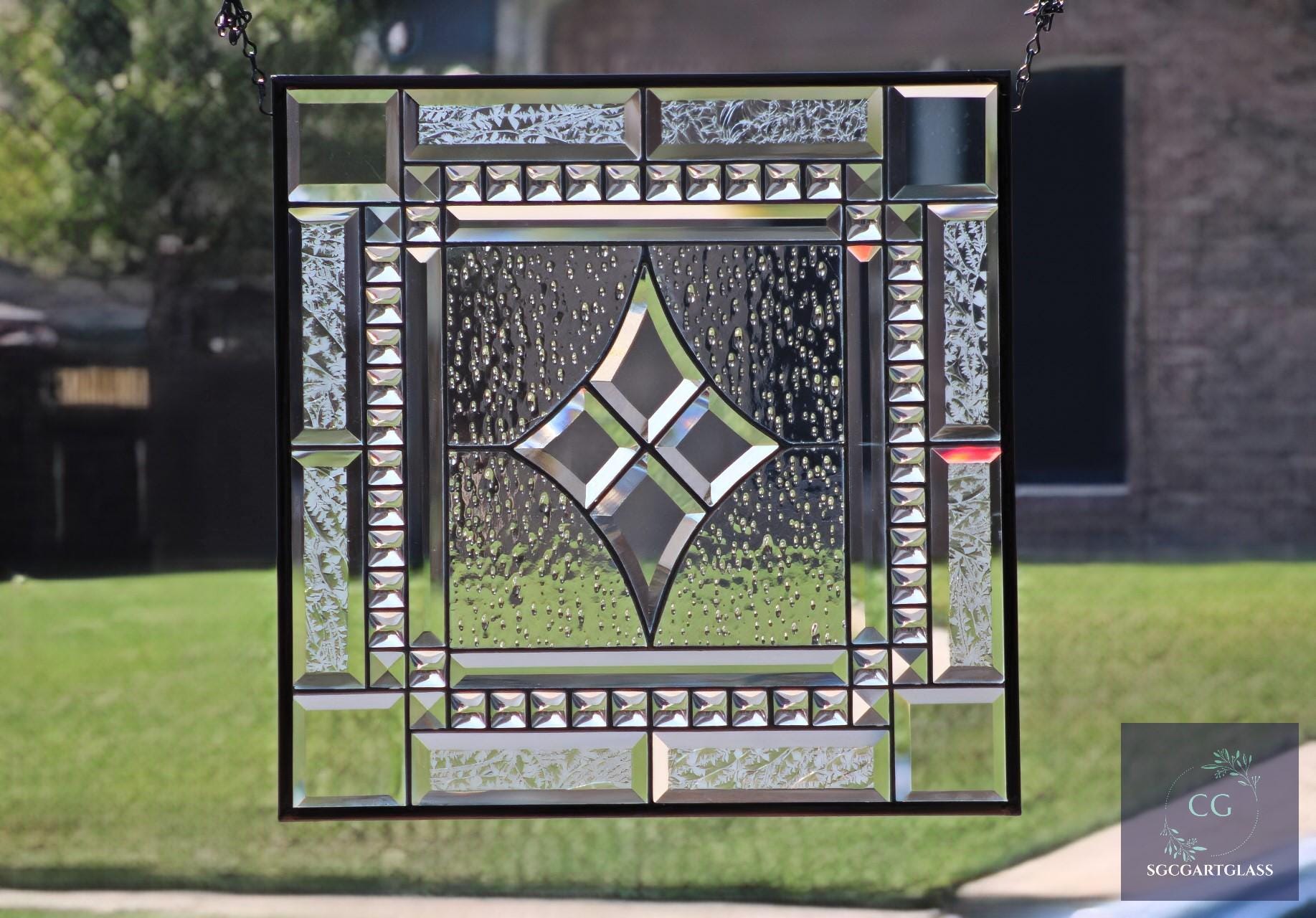 Clear stained glass window hanging, panel 18 3/8 inches, made in the USA with obscure textured glass, featuring Raindrop artglass design.